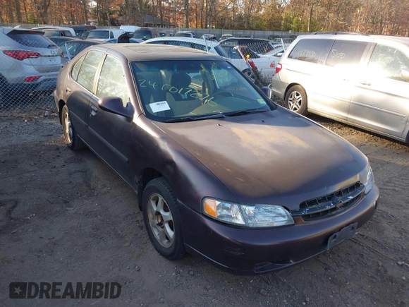 1999 Nissan Altima XE with VIN 1N4DL01D1XC193705, listed as a IAAI auction lot 40880059 with 183,605 mi miles. Bid and sale history available at carsss.com. Image 1.