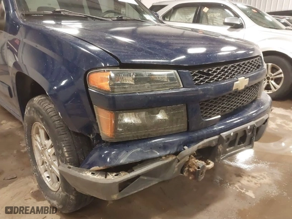 2012 Chevrolet Colorado LT w/1LT with VIN 1GCHTCFE0C8105626, listed as a IAAI auction lot 41559244 with 147,731 mi miles. Bid and sale history available at carsss.com. Image 6.