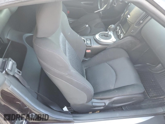 2010 Nissan 370Z Touring с VIN JN1AZ4FH0AM301069, выставлен на аукционе Copart как лот 82912404 с пробегом 55 803 миль миль и Списание • Salvage title. История ставок и продаж доступна на DreamBid. Изображение 10.