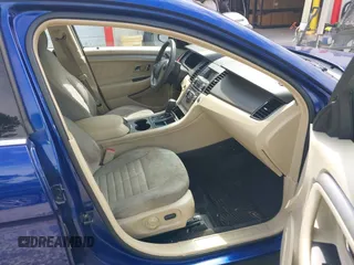 2013 Ford Taurus SE z VIN 1FAHP2D85DG153020, wystawiony jako IAAI lot #42307906 z przebiegiem 198 626 mil mil oraz . Historia ofert i sprzedaży dostępna na DreamBid. Obrazek 5.