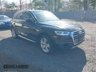 2018 Audi Q5 Premium Plus with VIN WA1BNAFY2J2248778, listed as a IAAI auction lot 42055696 with 100,679 mi miles. Bid and sale history available at carsss.com. Image 1.