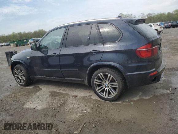 2012 BMW X5 35i z VIN 5UXZV4C5XCL748652, wystawiony jako Copart lot #55457455 z przebiegiem 149 030 mil mil oraz Szkoda całkowita • Salvage title. Historia ofert i sprzedaży dostępna na DreamBid. Obrazek 2.