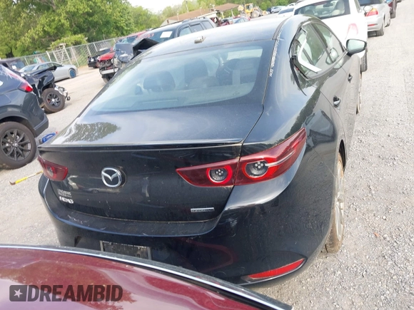 2021 Mazda 3 Premium z VIN 3MZBPADL2MM254467, wystawiony jako IAAI lot #42151557 z przebiegiem 63 282 mil mil oraz . Historia ofert i sprzedaży dostępna na DreamBid. Obrazek 17.