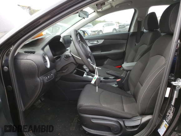 2023 Kia Forte LXS with VIN 3KPF24AD6PE528088, listed as a Copart auction lot 71569484 with 23,281 mi miles and Salvage Title. Bid and sale history available at carsss.com. Image 7.