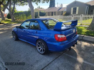 2005 Subaru Impreza Sedan (Natl) WRX STi w/Gold Wheels with VIN JF1GD70695L510603, listed as a Copart auction lot 48634505 with 145,565 mi miles and Salvage Title. Bid and sale history available at carsss.com. Image 3.