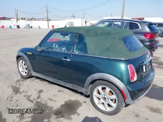 2006 MINI Convertible with VIN WMWRF33566TG15710, listed as a IAAI auction lot 41636955 with Not Provided miles and . Bid and sale history available at DreamBid. Image 3.