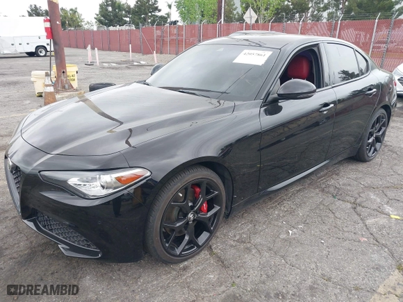 2021 Alfa Romeo Giulia Ti Sport with VIN ZARFAMBN5M7645723, listed as a IAAI auction lot 42057861 with 63,594 mi miles. Bid and sale history available at carsss.com. Image 2.