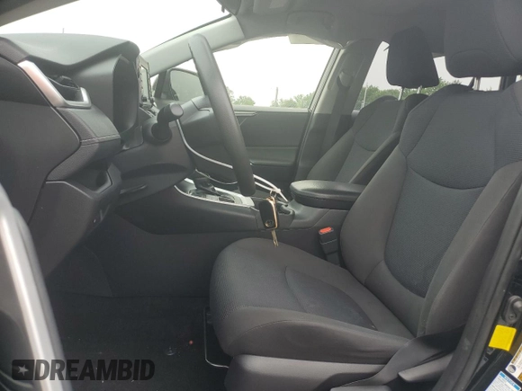 2019 Toyota RAV4 LE with VIN JTMG1RFV0KD506247, listed as a Copart auction lot 60426425 with 60,448 mi miles and Salvage title. Bid and sale history available at DreamBid. Image 7.