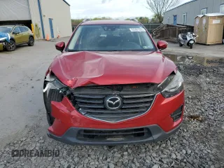 2016 Mazda CX-5 Grand Touring with VIN JM3KE4DY6G0753826, listed as a Copart auction lot 55391555 with 96,852 mi miles and Salvage Title. Bid and sale history available at DreamBid. Image 5.