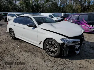 2020 BMW 5 Series M550i xDrive with VIN WBAJS7C06LCD07565, listed as a Copart auction lot 42618365 with Not provided miles and Non repairable. Bid and sale history available at DreamBid. Image 4.