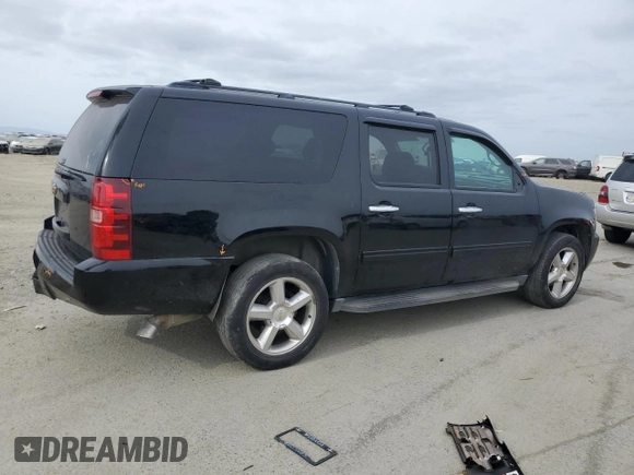 2013 Chevrolet Suburban LT with VIN 1GNSCJE01DR349353, listed as a Copart auction lot 54526315 with Not provided miles and Salvage title. Bid and sale history available at DreamBid. Image 3.