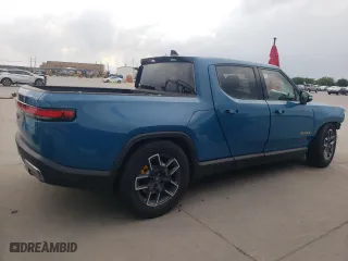 2023 Rivian R1T Adventure with VIN 7FCTGAAA8PN017335, listed as a Copart auction lot 63705604 with 0 mi miles and Clean Title. Bid and sale history available at carsss.com. Image 3.