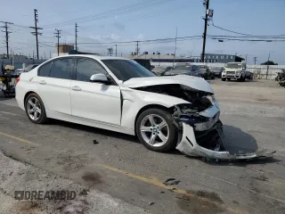 2015 BMW 3 Series 328i with VIN WBA3A5C56FF606517, listed as a Copart auction lot 59388115 with 185,684 mi miles and Salvage title. Bid and sale history available at DreamBid. Image 4.