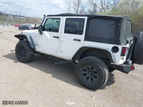 2012 Jeep Wrangler Unlimited Sahara with VIN 1C4BJWEG9CL220965, listed as a IAAI auction lot 41902295 with 120,492 mi miles. Bid and sale history available at carsss.com. Image 3.