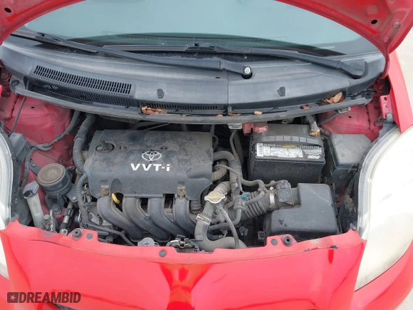 2009 Toyota Yaris with VIN JTDKT903295244022, listed as a IAAI auction lot 41615570 with 165,964 mi miles. Bid and sale history available at carsss.com. Image 10.