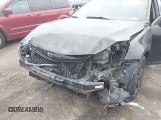 2014 Kia Optima LX with VIN 5XXGM4A73EG280685, listed as a IAAI auction lot 41190691 with 153,957 mi miles. Bid and sale history available at carsss.com. Image 6.