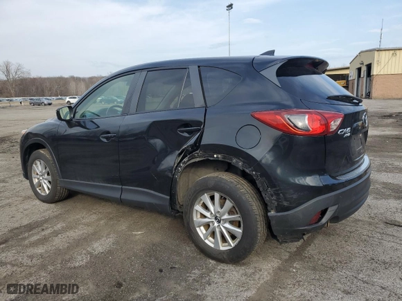 2016 Mazda CX-5 Touring with VIN JM3KE4CY7G0860868, listed as a Copart auction lot 51203415 with 86,768 mi miles and Salvage Title. Bid and sale history available at carsss.com. Image 2.