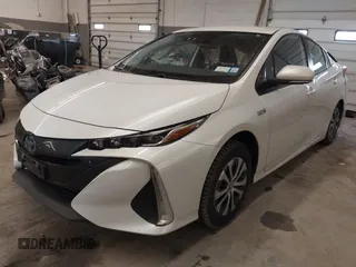 2022 Toyota Prius LE with VIN JTDKAMFP4N3223259, listed as a IAAI auction lot 41975054 with 49,558 mi miles and . Bid and sale history available at DreamBid. Image 2.