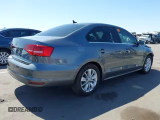 2015 Volkswagen Jetta SE with VIN 3VWD17AJ6FM406091, listed as a IAAI auction lot 42539626 with 82,005 mi miles and . Bid and sale history available at DreamBid. Image 4.