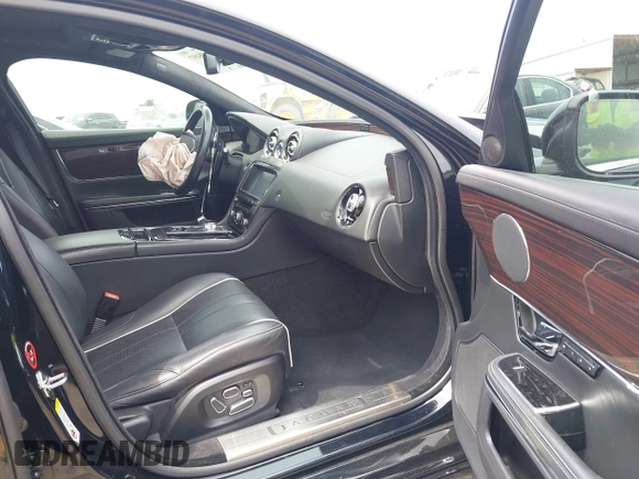 2011 Jaguar XJ with VIN SAJWA1CB3BLV07259, listed as a IAAI auction lot 42108497 with 90,498 mi miles and . Bid and sale history available at DreamBid. Image 5.