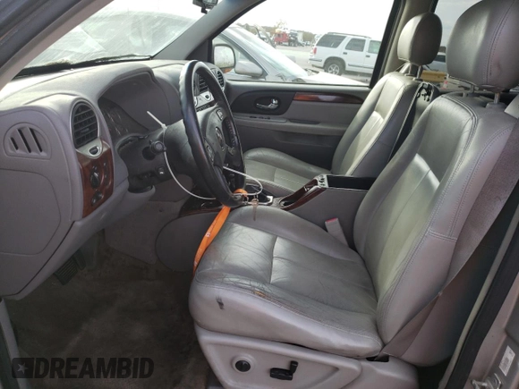 2005 GMC Envoy SLT with VIN 1GKDS13S752319457, listed as a Copart auction lot 74073633 with 181,969 mi miles and Clean Title. Bid and sale history available at carsss.com. Image 7.