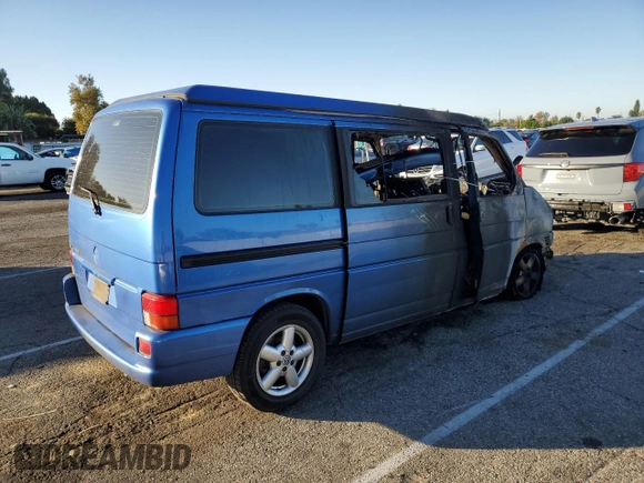 2001 Volkswagen EuroVan MV с VIN WV2NB47061H099148, выставлен на аукционе Copart как лот 77123813 с пробегом Не указан миль и На запчасти • Non repairable. История ставок и продаж доступна на DreamBid. Изображение 3.