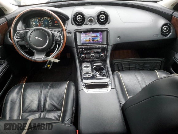 2016 Jaguar XJ R-Sport with VIN SAJWJ1CD7G8V95129, listed as a Copart auction lot 73569464 with 143,740 mi miles and Clean title. Bid and sale history available at DreamBid. Image 8.