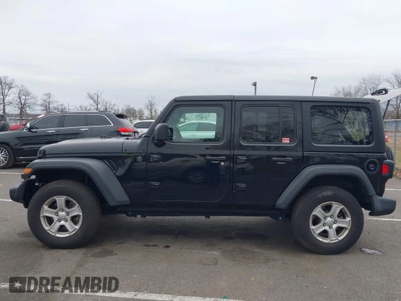 2022 Jeep Wrangler Unlimited Willys Sport with VIN 1C4HJXDN3NW132771, listed as a IAAI auction lot 41052274 with 33,302 mi miles and . Bid and sale history available at DreamBid. Image 14.