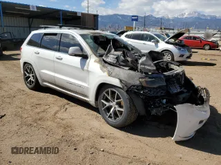 2015 Jeep Grand Cherokee Summit с VIN 1C4RJFJT5FC796820, выставлен на аукционе Copart как лот 49226795 с пробегом Не указан миль и Списание • Salvage title. История ставок и продаж доступна на DreamBid. Изображение 4.