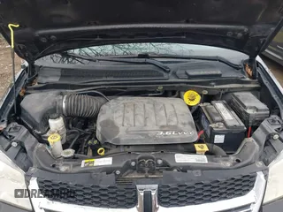 2015 Dodge Grand Caravan American Value with VIN 2C4RDGBG5FR512267, listed as a IAAI auction lot 41923200 with 154,234 mi miles and . Bid and sale history available at DreamBid. Image 10.