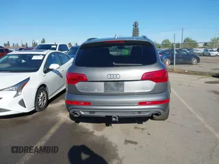 2014 Audi Q7 3.0T S line Prestige with VIN WA1DGAFE2ED009086, listed as a IAAI auction lot 41824179 with 136,899 mi miles. Bid and sale history available at carsss.com. Image 16.