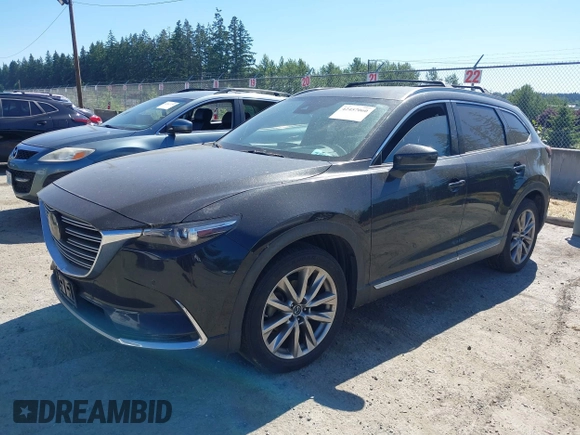 2018 Mazda CX-9 Grand Touring z VIN JM3TCBDY2J0237050, wystawiony jako IAAI lot #42457060 z przebiegiem 130 625 mil mil oraz . Historia ofert i sprzedaży dostępna na DreamBid. Obrazek 17.