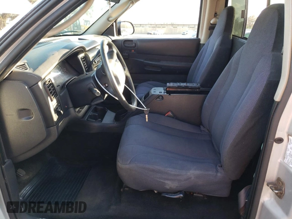 2003 Dodge Dakota with VIN 1D7GG16X33S130101, listed as a Copart auction lot 85999314 with 221,292 mi miles and Salvage Title. Bid and sale history available at carsss.com. Image 7.
