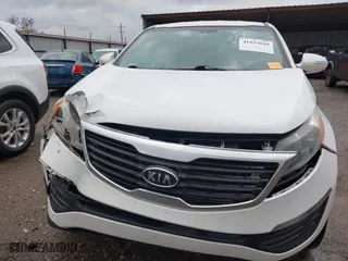 2012 Kia Sportage LX with VIN KNDPB3A2XC7283612, listed as a IAAI auction lot 41957810 with 165,899 mi miles. Bid and sale history available at carsss.com. Image 12.