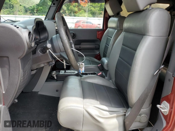 2009 Jeep Wrangler X с VIN 1J4FA24129L749314, выставлен на аукционе Copart как лот 58160995 с пробегом 93 603 миль миль и Списание • Salvage title. История ставок и продаж доступна на DreamBid. Изображение 7.