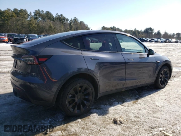 2023 Tesla Model Y Long Range with VIN 7SAYGDEE8PF889879, listed as a Copart auction lot 46115535 with 17,818 mi miles and Salvage Title. Bid and sale history available at DreamBid. Image 3.