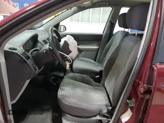 2006 Ford Focus S z VIN 1FAFP34N76W153239, wystawiony jako Copart lot #53085555 z przebiegiem 118 259 mil mil oraz Szkody całkowita. Historia ofert i sprzedaży dostępna na DreamBid. Obrazek 7.