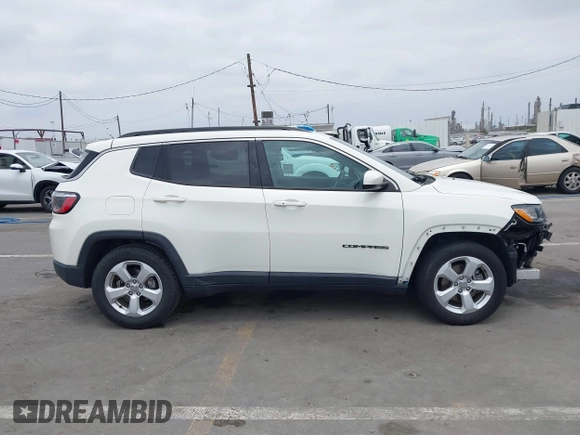 2021 Jeep Compass Latitude with VIN 3C4NJCBB6MT538682, listed as a IAAI auction lot 42442459 with 59,163 mi miles and . Bid and sale history available at DreamBid. Image 14.