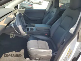 2022 Tesla Model Y Long Range z VIN 7SAYGDEE2NF513823, wystawiony jako Copart lot #51174795 z przebiegiem 28 143 mil mil oraz Szkody całkowita. Historia ofert i sprzedaży dostępna na DreamBid. Obrazek 7.