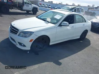2009 Mercedes-Benz C-Class 3.5L Sport with VIN WDDGF56XX9R049302, listed as a IAAI auction lot 41783615 with 111,726 mi miles. Bid and sale history available at carsss.com. Image 12.