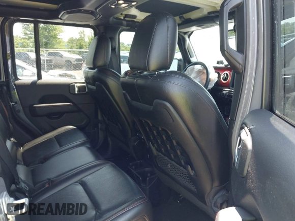 2021 Jeep Gladiator Rubicon with VIN 1C6JJTBG2ML515932, listed as a IAAI auction lot 42471704 with 57,775 mi miles and . Bid and sale history available at DreamBid. Image 8.