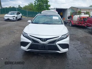 2023 Toyota Camry TRD z VIN 4T1KZ1AK8PU073362, wystawiony jako IAAI lot #42244183 z przebiegiem 103 245 mil mil oraz . Historia ofert i sprzedaży dostępna na DreamBid. Obrazek 13.