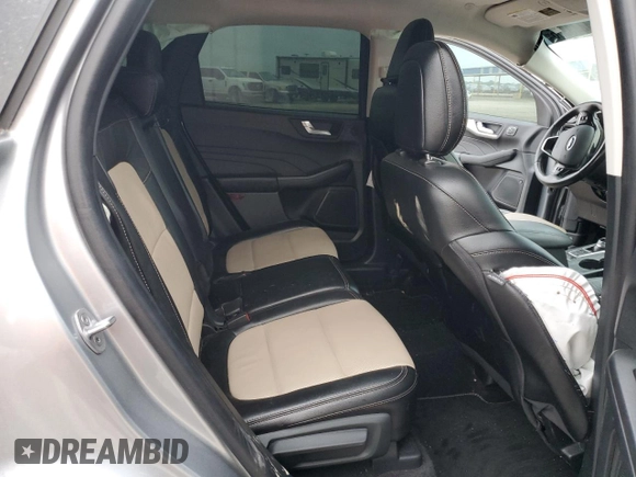 2021 Ford Escape Titanium с VIN 1FMCU9J99MUB12020, выставлен на аукционе Copart как лот 51443365 с пробегом 63 504 миль миль и Списание • Salvage title. История ставок и продаж доступна на DreamBid. Изображение 11.