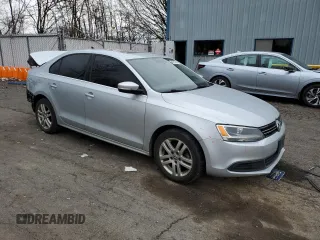 2014 Volkswagen Jetta TDI w/Premium with VIN 3VWLL7AJ6EM431528, listed as a Copart auction lot 48717075 with 149,664 mi miles and Salvage title. Bid and sale history available at DreamBid. Image 4.