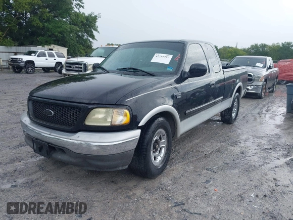2003 Ford F-150 XL with VIN 1FTRX17L13NA01819, listed as a IAAI auction lot 42719787 with Not provided miles and . Bid and sale history available at DreamBid. Image 2.