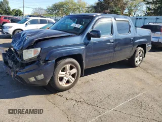 2009 Honda Ridgeline RTL with VIN 2HJYK16559H500181, listed as a Copart auction lot 74242164 with 81,888 mi miles and Salvage Title. Bid and sale history available at carsss.com. Image 1.