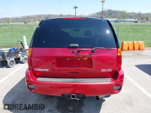 2005 GMC Envoy SLT with VIN 1GKDS13SX52144959, listed as a IAAI auction lot 41968495 with 238,199 mi miles. Bid and sale history available at carsss.com. Image 16.