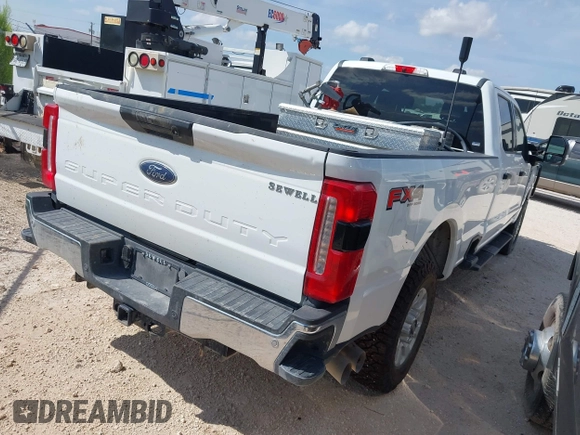 2023 Ford F-250 XL with VIN 1FT7W2BT2PEC64642, listed as a IAAI auction lot 42661561 with 22,936 mi miles and . Bid and sale history available at DreamBid. Image 4.
