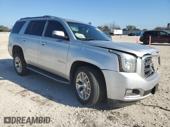 2015 GMC Yukon SLE with VIN 1GKS1AKC1FR716322, listed as a Copart auction lot 85992964 with 141,552 mi miles and Salvage Title. Bid and sale history available at carsss.com. Image 4.