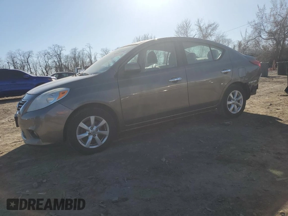 2012 Nissan Versa SV with VIN 3N1CN7APXCL817408, listed as a Copart auction lot 49101125 with 118,417 mi miles and Salvage Title. Bid and sale history available at carsss.com. Image 1.